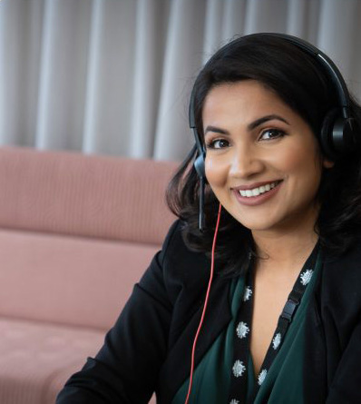 A smiling Agency employee
